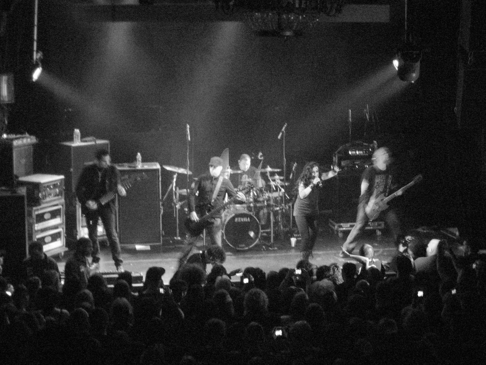 Rock band performing live on a concert stage