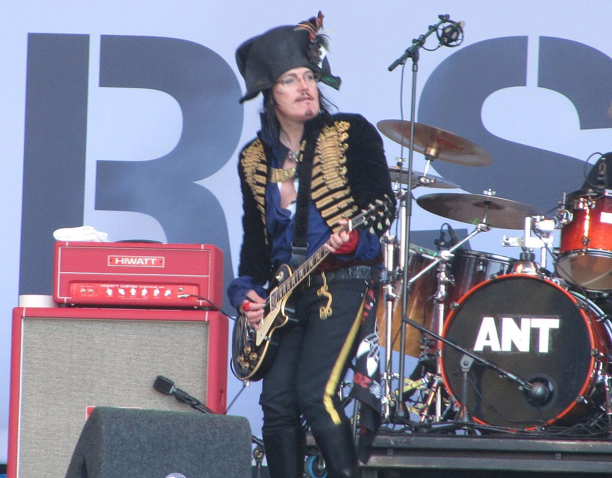 Adam Ant playing guitar on stage at Parkpop 2012 in The Hague