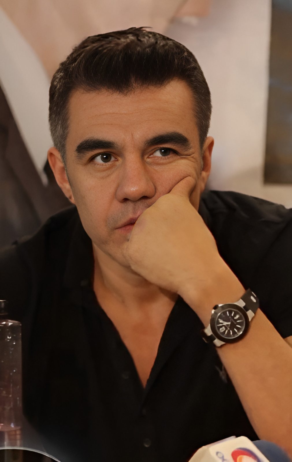 Adrian Uribe at a press conference, 2017