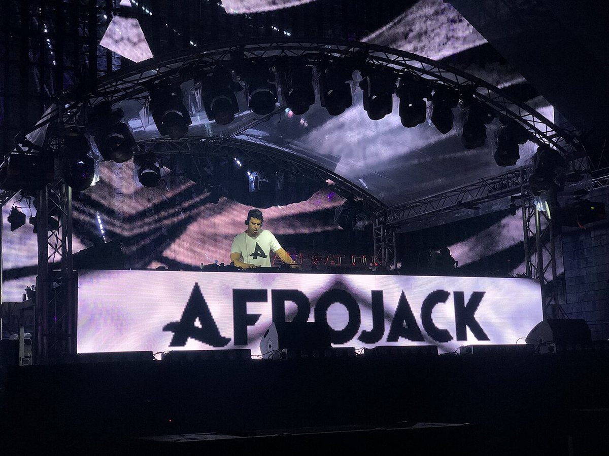 Buy Afrojack tickets on StubOrder Afrojack DJing behind his name banner at Airbeat One Festival, Neustadt-Glewe, Germany, 2018