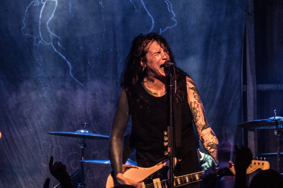 Laura Jane Grace of Against Me! singing and playing guitar at Codfish Hollow, Maquoketa, Iowa, 2018