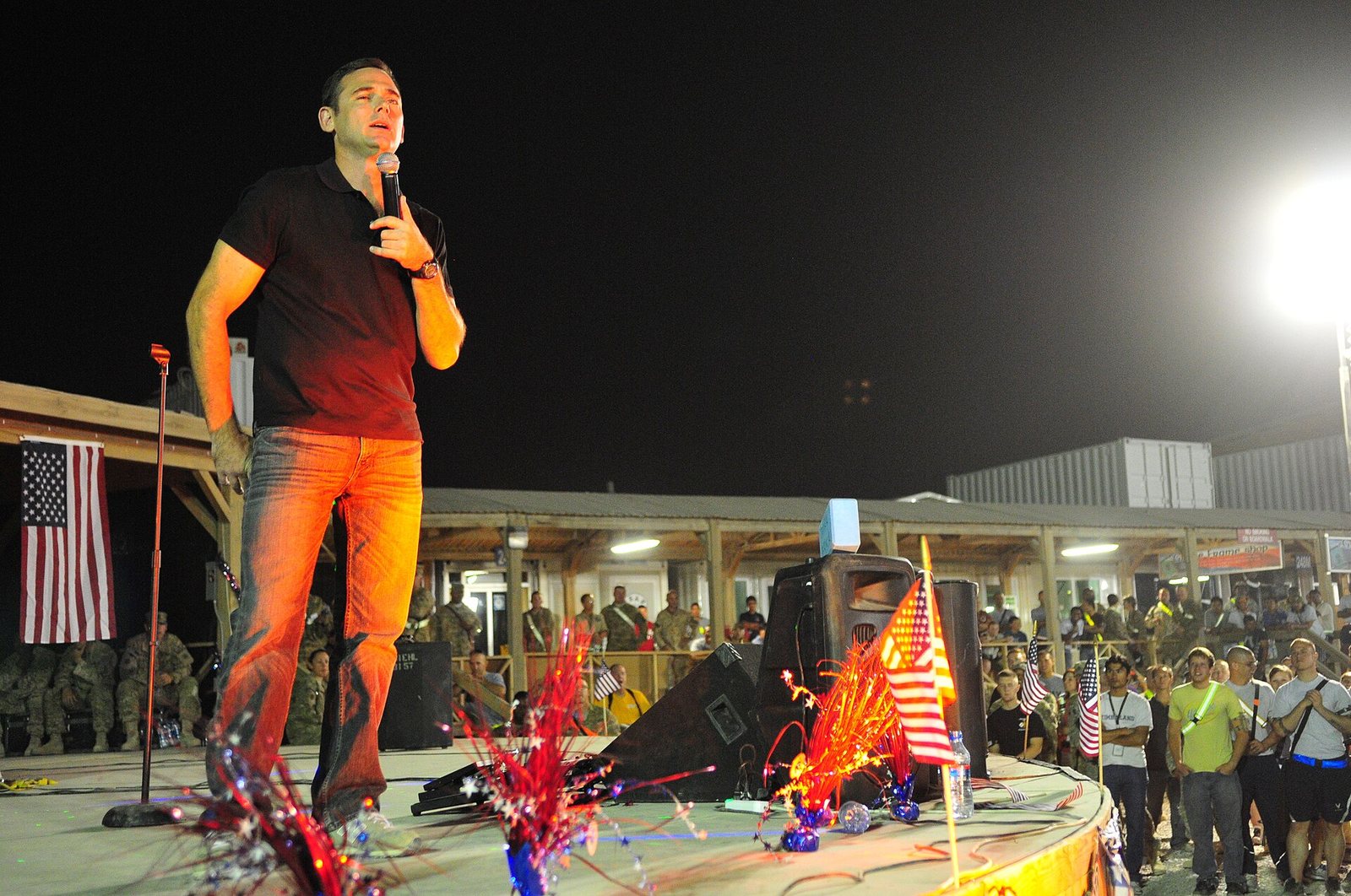 Andy Hendrickson performing stand-up for service members at Kandahar Airfield, Afghanistan, 2011