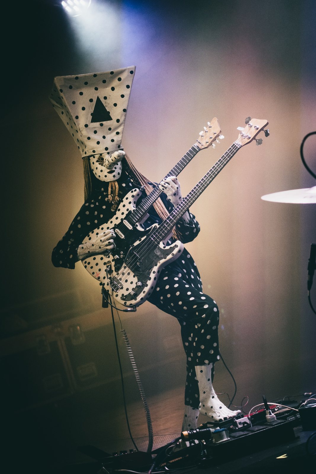 Angine de Poitrine's masked guitarist playing a double-neck guitar at The Great Escape, Brighton, May 2026