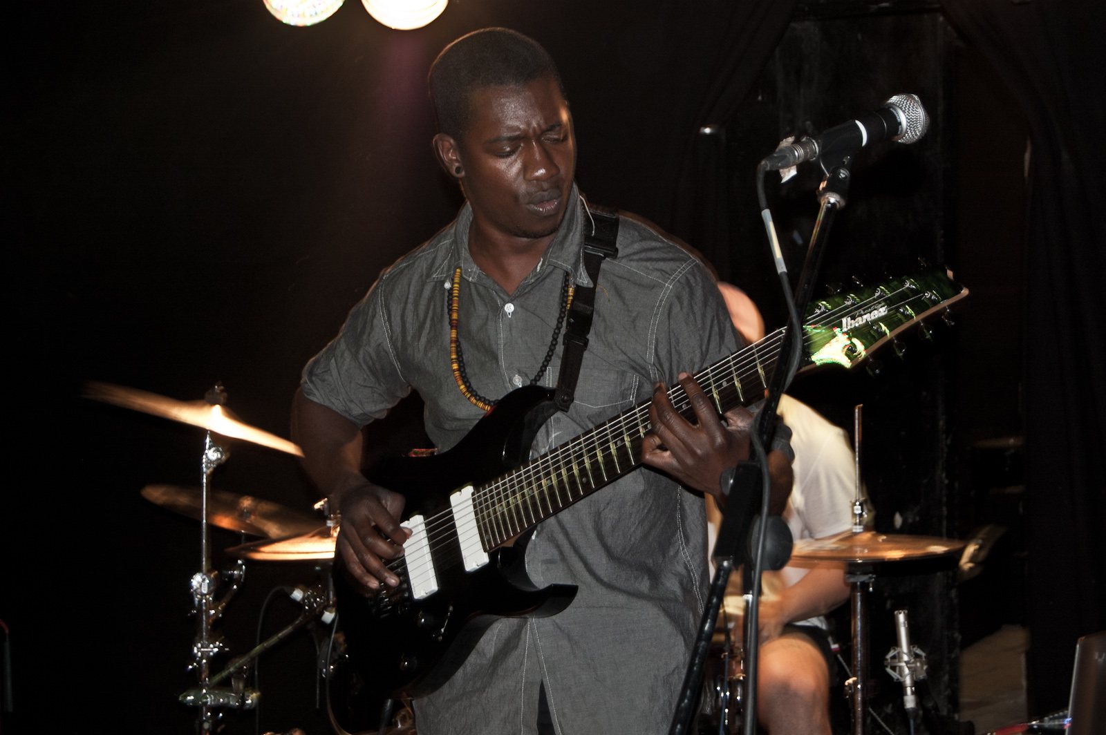 Tosin Abasi of Animals As Leaders playing guitar at The Forum, Tunbridge Wells, 2011