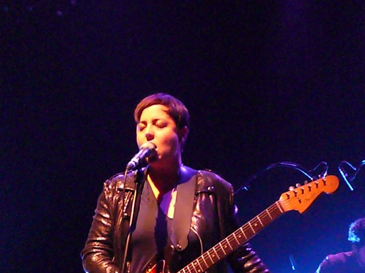 Ariane Moffatt singing and playing electric guitar in concert at Annemasse, France, 2009