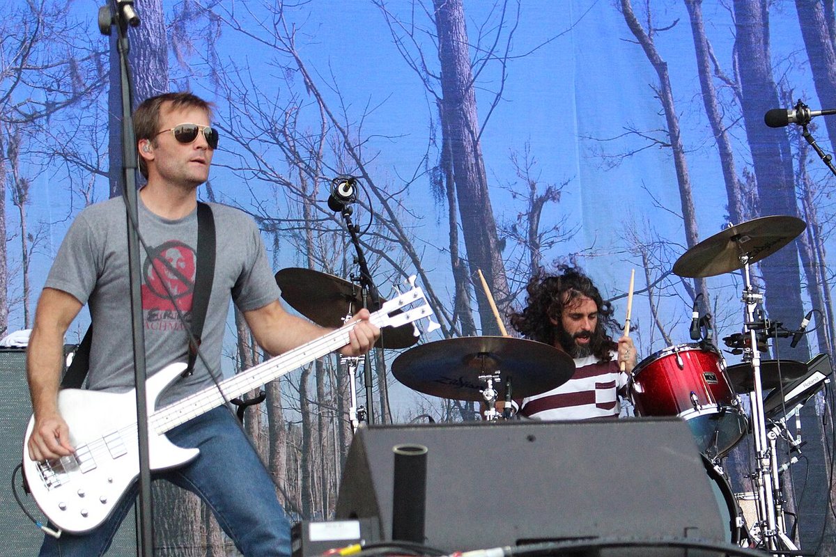Band of Horses bassist and drummer performing on stage at Frequency Festival, Austria, 2017