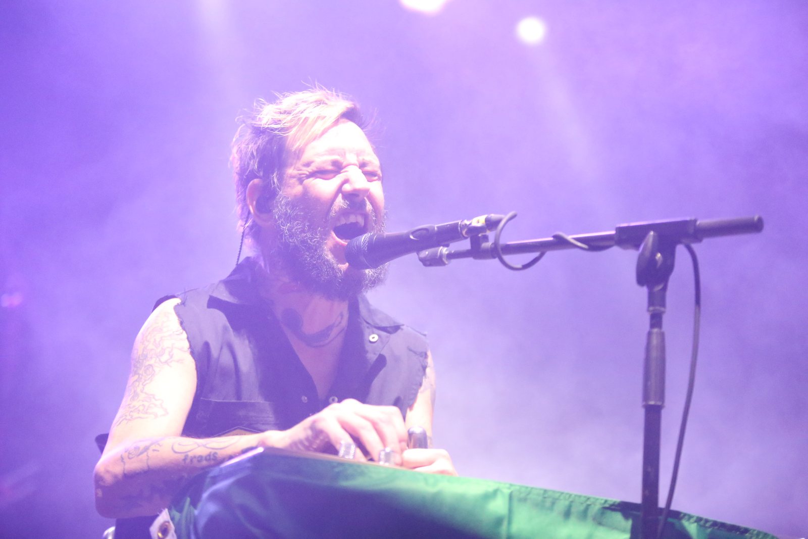 Ben Bridwell of Band of Horses singing on stage at Bumbershoot, Seattle, 2023