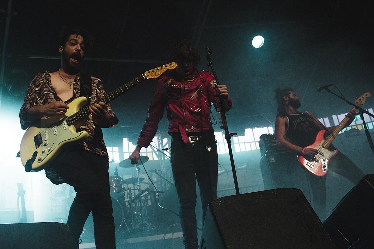 Barns Courtney and his band on stage in the Spiegeltent at Haldern Pop Festival, 2019