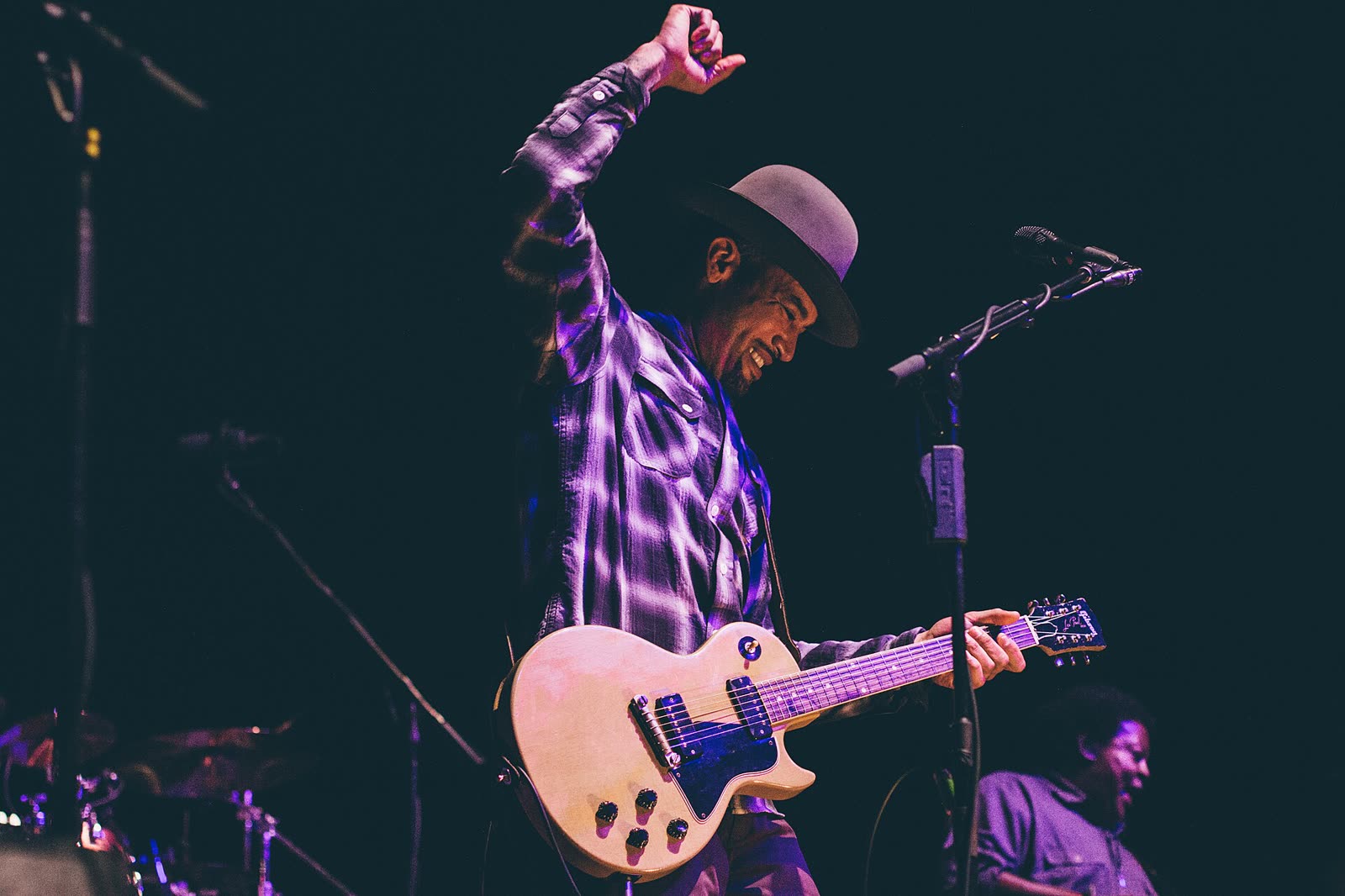 Ben Harper performing live on stage with guitar - Ben Harper tickets