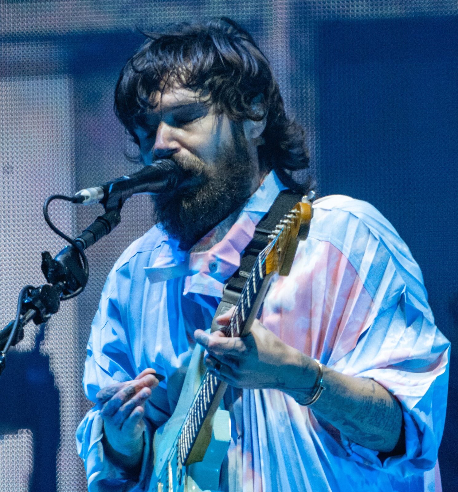 Simon Neil of Biffy Clyro singing and playing guitar at Reading Festival, 2021