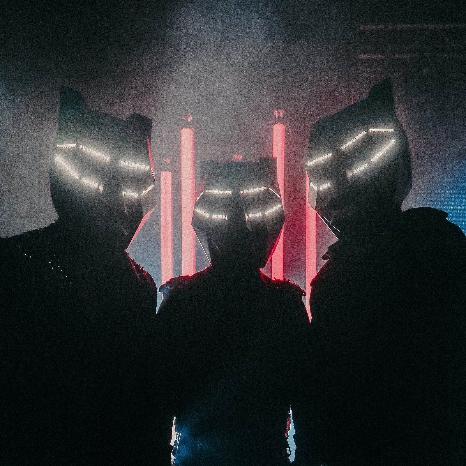 Black Tiger Sex Machine wearing their LED tiger masks, 2018