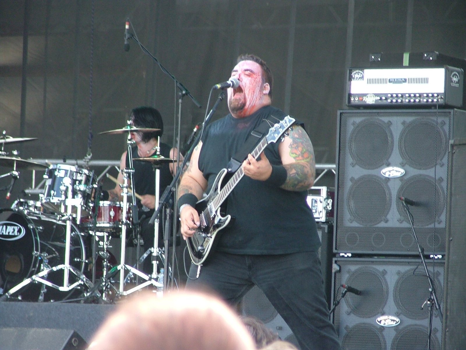 TB Monstrosity of Blitzkid singing and playing guitar at Summer Breeze festival, Dinkelsbühl, Germany, 2007