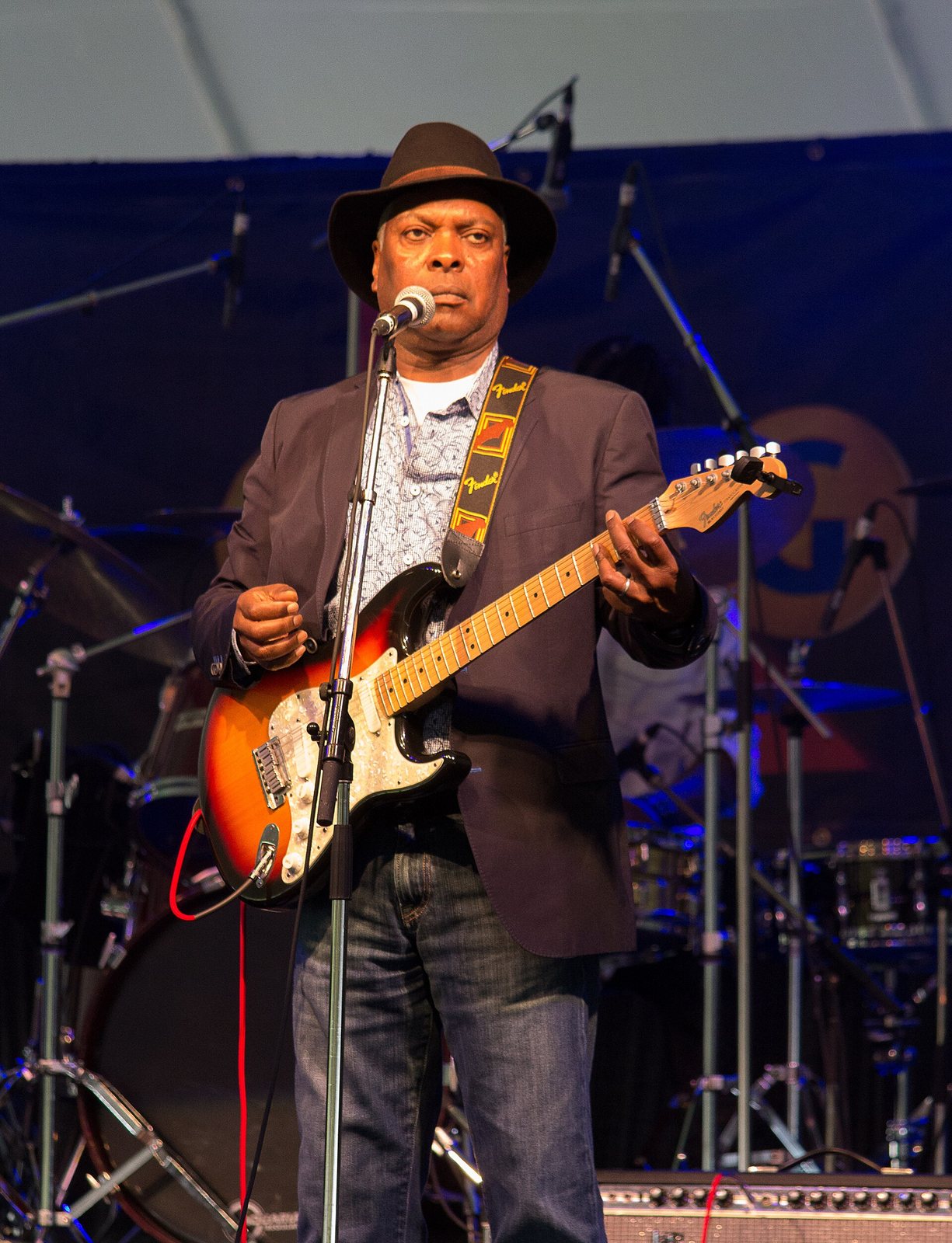Booker T. Jones playing electric guitar on stage at the Kitchener Blues Festival, Ontario, 2013