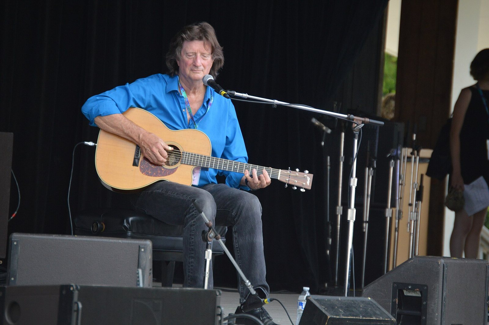 Chris Smither playing acoustic guitar on the main stage at the Philadelphia Folk Festival, 2018