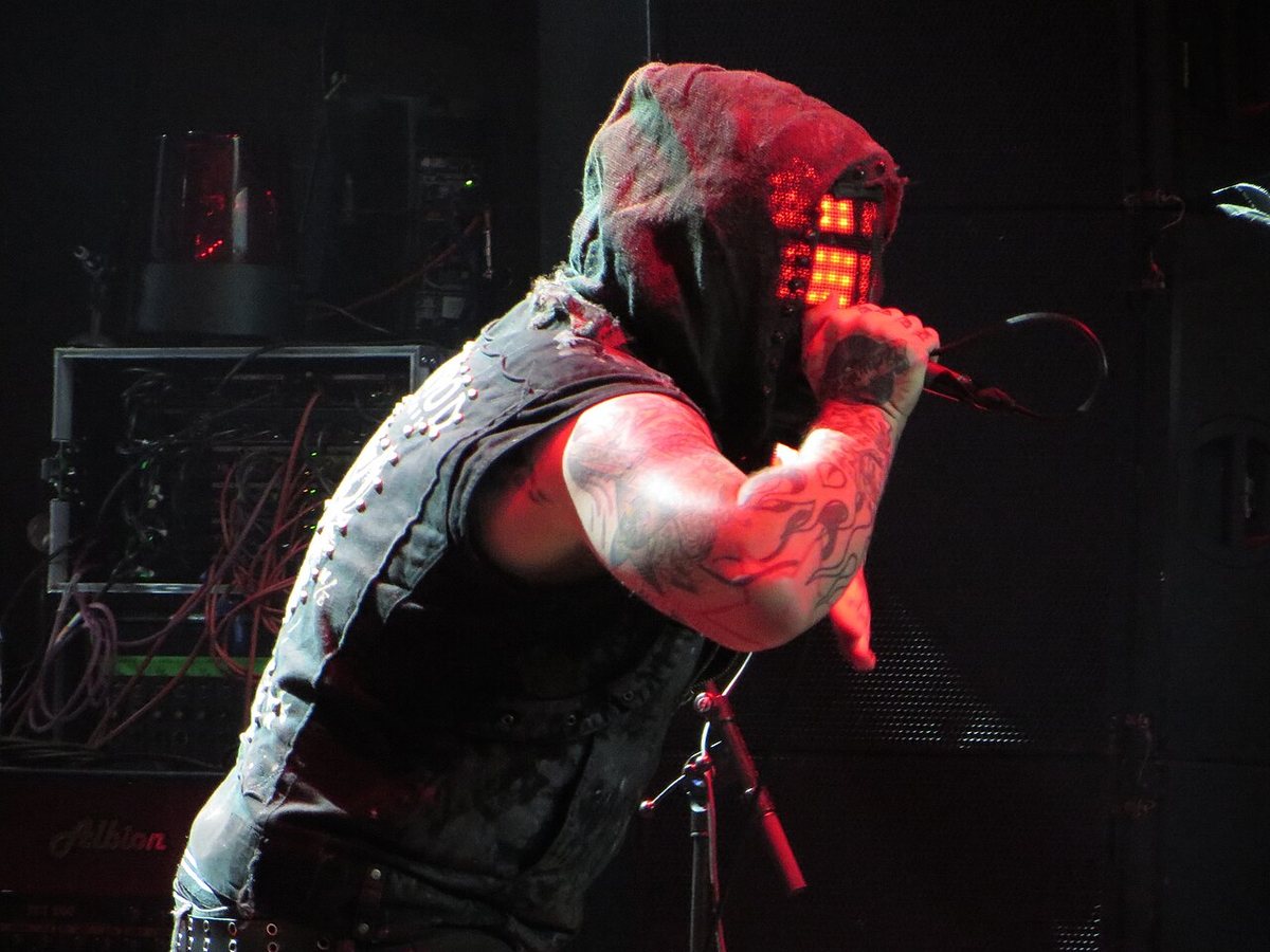 Buy Combichrist tickets on StubOrder Andy LaPlegua of Combichrist performing in an LED mask at Wacken Open Air, Germany, 2015