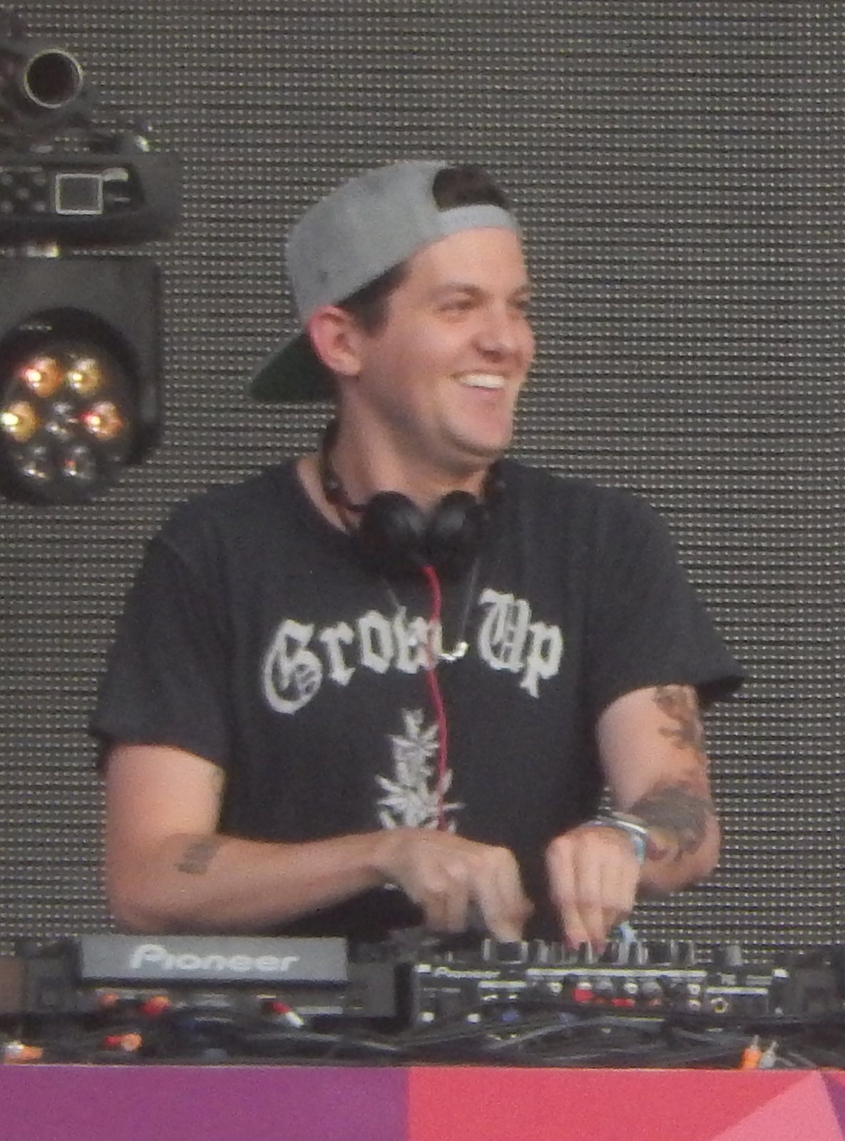 Dillon Francis smiling behind the decks at Spring Awakening festival, Chicago, 2014