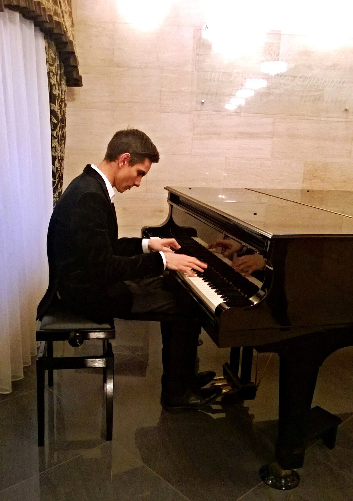 Dmitry Shishkin rehearsing at the piano before a concert in Żywiec, Poland, 2016