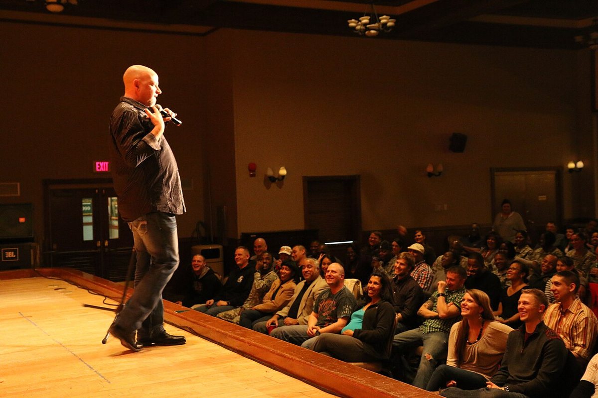 Don Barnhart performing stand-up for an audience at U.S. Army Garrison Humphreys, South Korea, 2014
