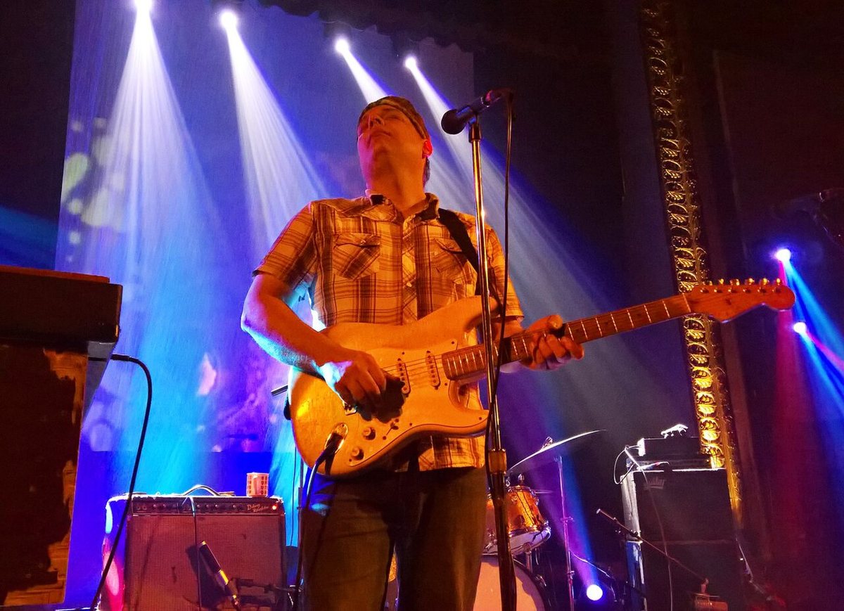 Buy Cyril Neville & Donna The Buffalo tickets on StubOrder Jeb Puryear of Donna the Buffalo playing guitar on stage, 2018