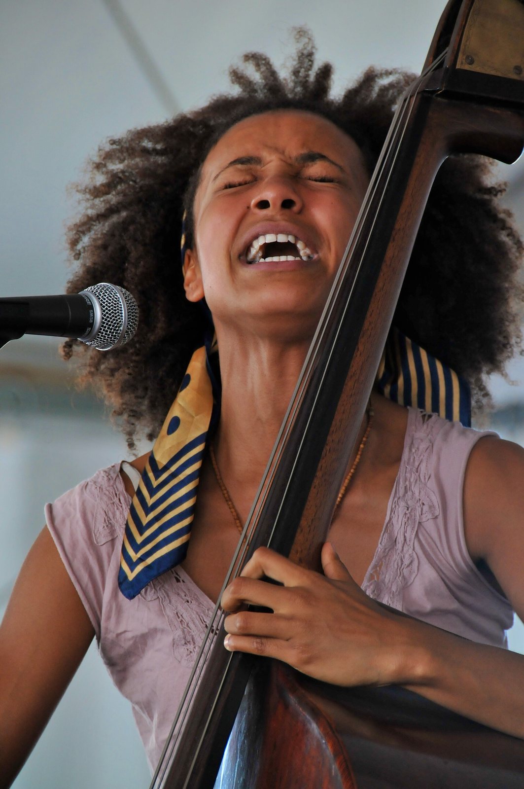 Esperanza Spalding singing and playing double bass at the Newport Jazz Festival, 2008
