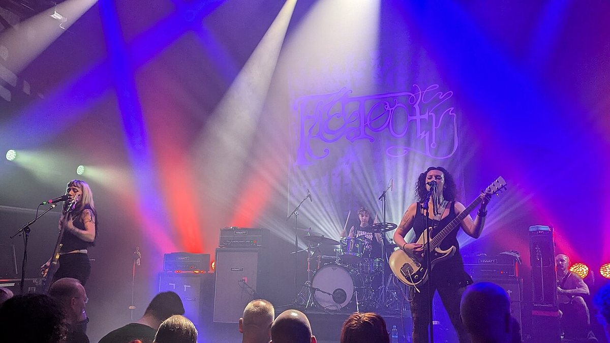 Faetooth on stage under purple lights at Doornroosje, Nijmegen, Netherlands, June 2026