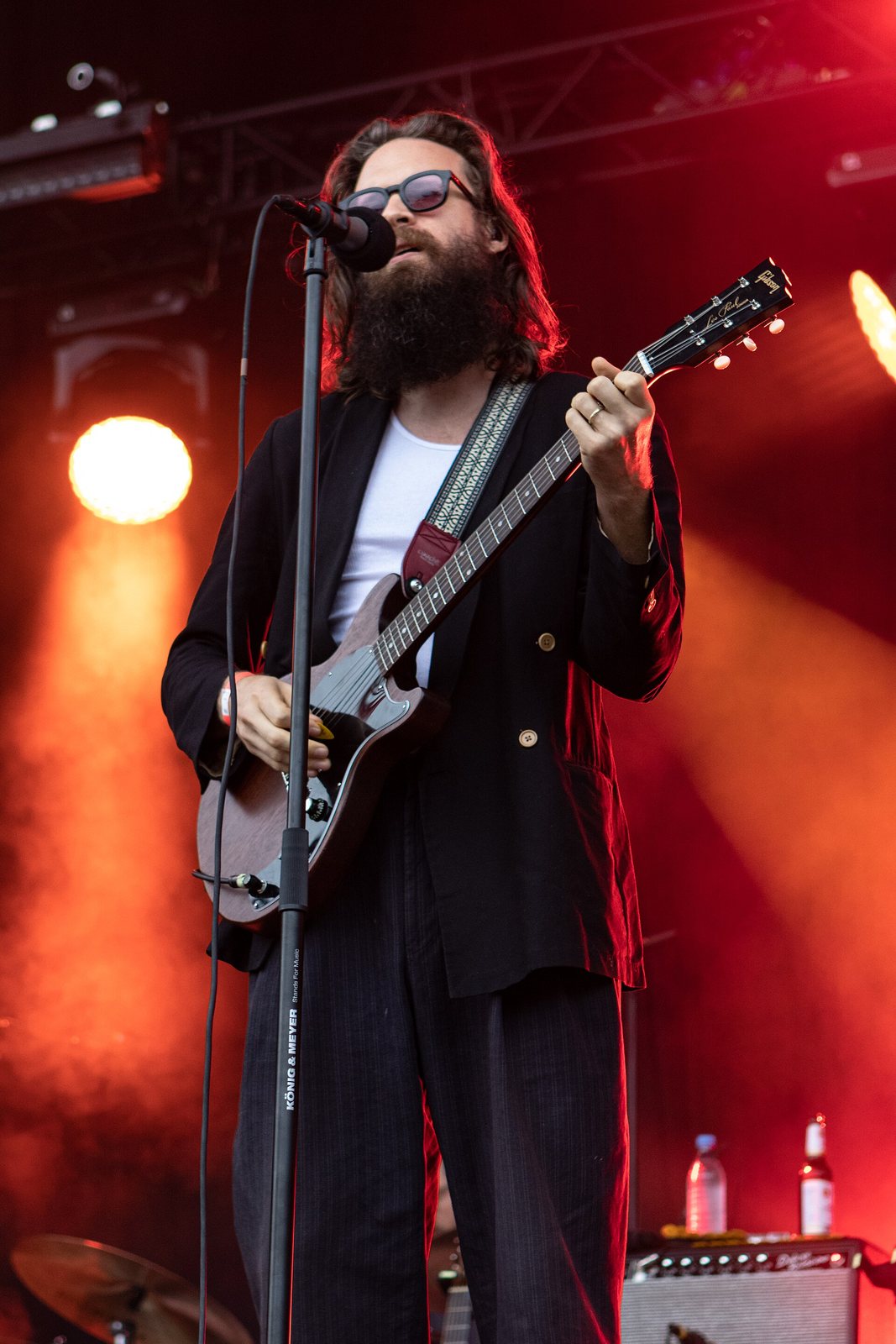 Father John Misty performing with an electric guitar on the main stage at Haldern Pop Festival, Germany, 2019