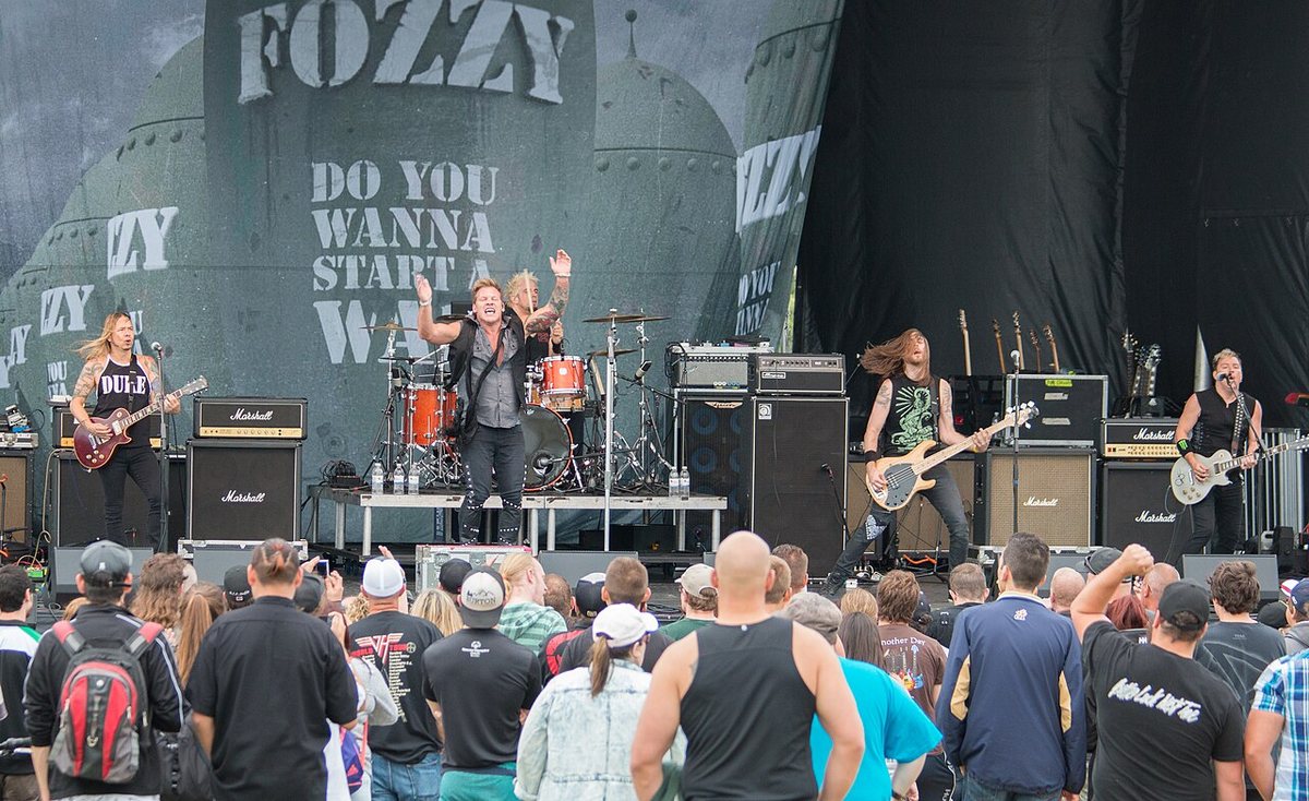 Fozzy performing in front of their backdrop at the Festival of Friends in Ancaster, Ontario, 2015
