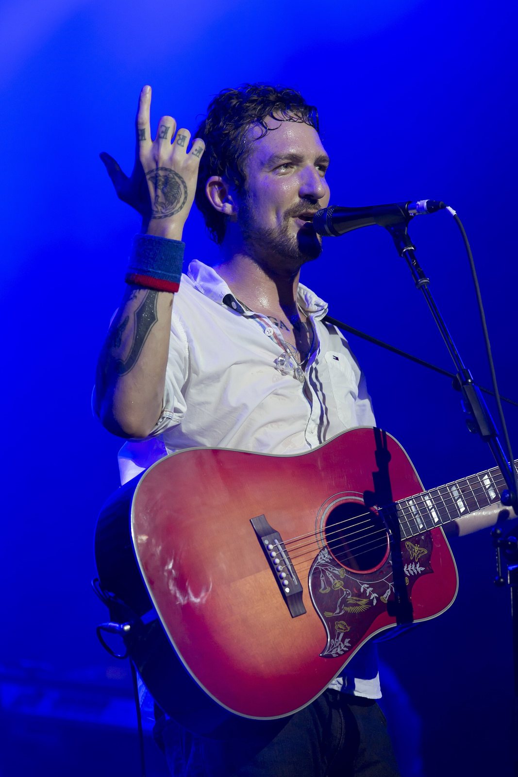 Frank Turner singing with an acoustic guitar at Byron Bay Bluesfest, Australia, 2015