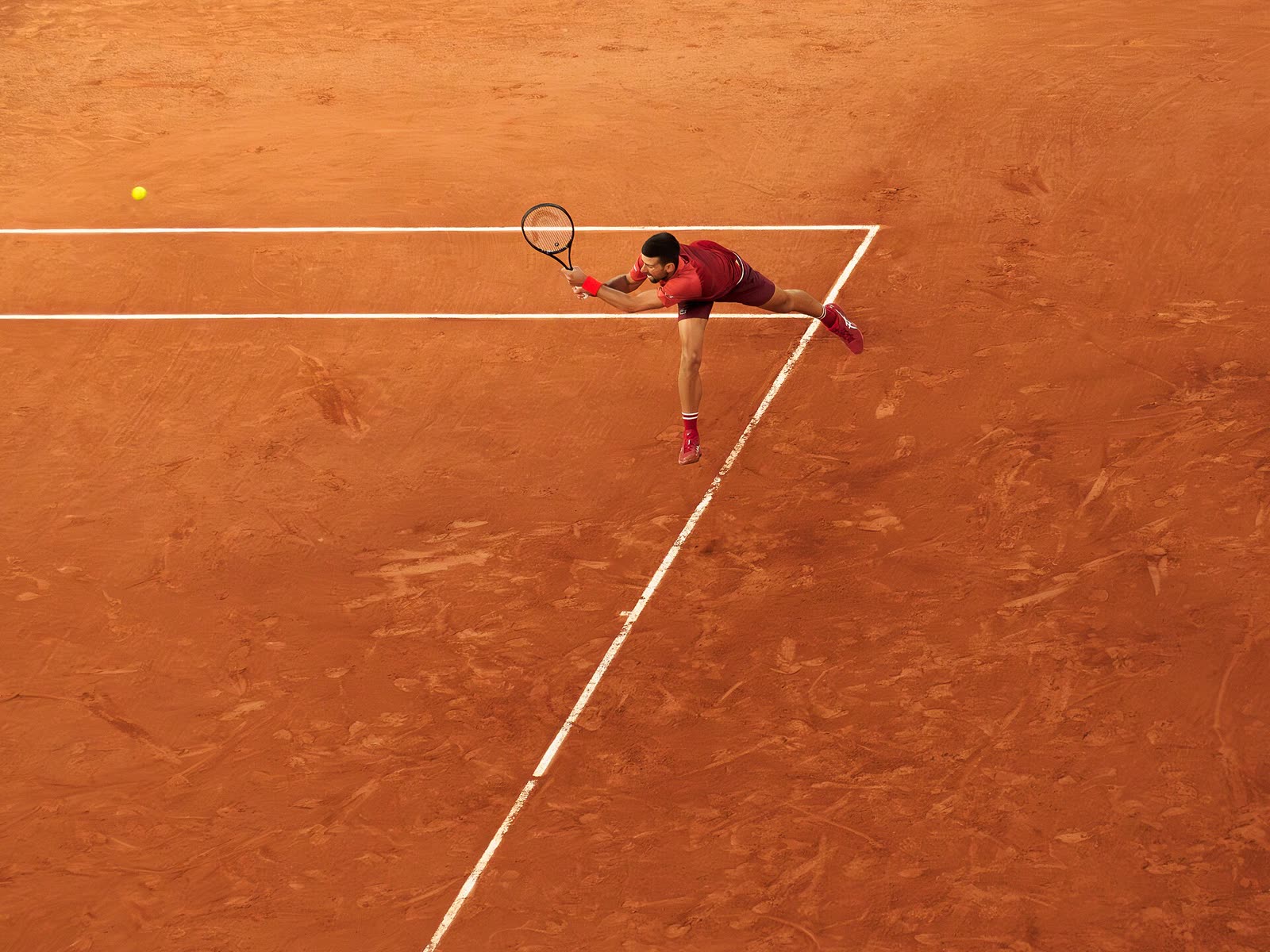 Novak Djokovic hitting a backhand at the 2024 French Open - French Open tickets