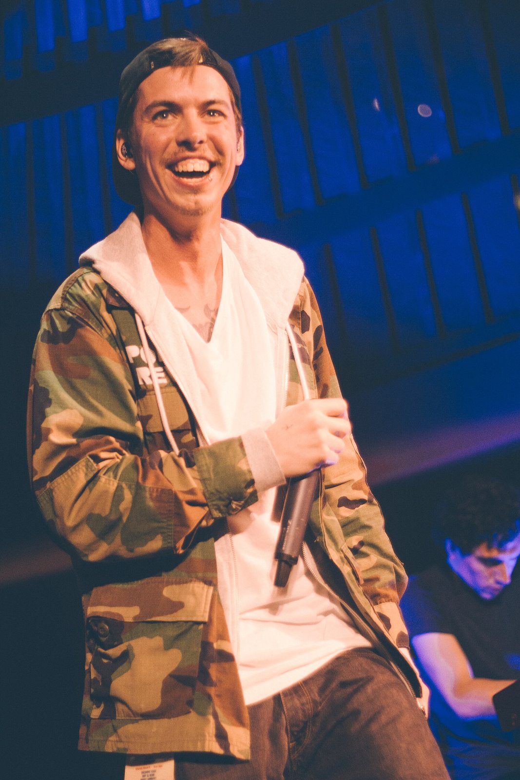 Grieves performing with a microphone at Quantum Collective's SXSW showcase, Austin, Texas, 2014