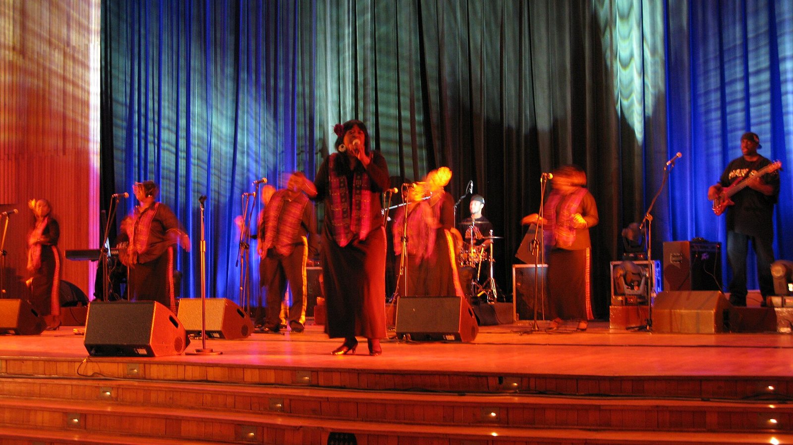 Harlem Gospel Choir singers and band performing on stage in concert, 2008