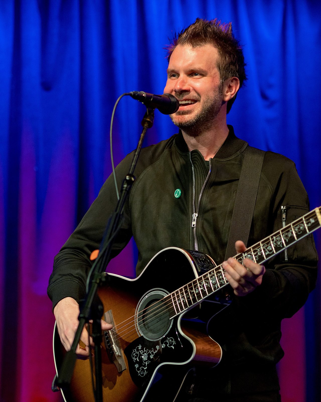 Howie Day singing and playing acoustic guitar at Hotel Cafe, 2023