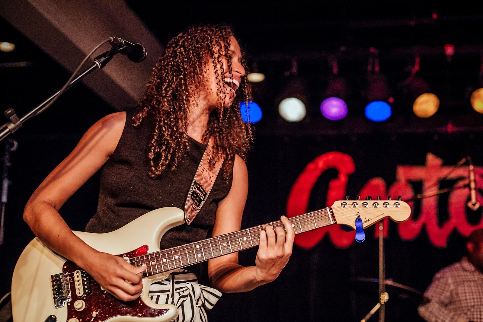 Jackie Venson playing guitar on stage at Antone's in Austin, Texas, 2016