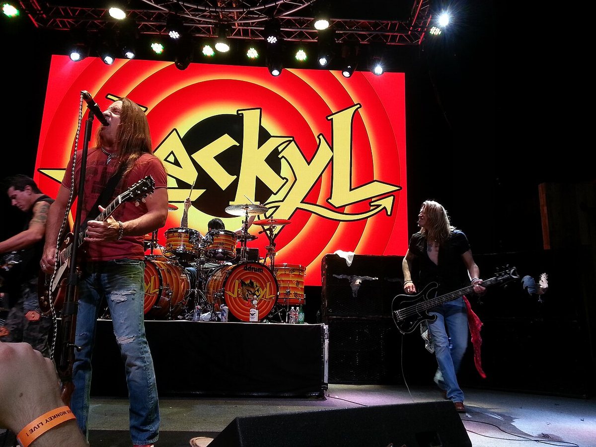Buy Jackyl tickets on StubOrder Jackyl performing in front of their logo backdrop in 2014