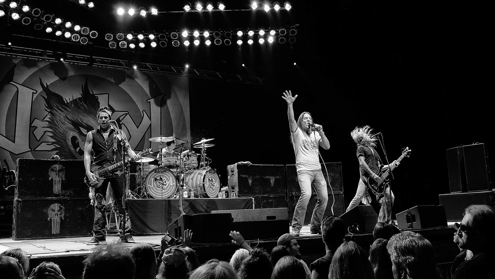 Jackyl performing on stage at the York Fair in York, Pennsylvania, 2014, in black and white