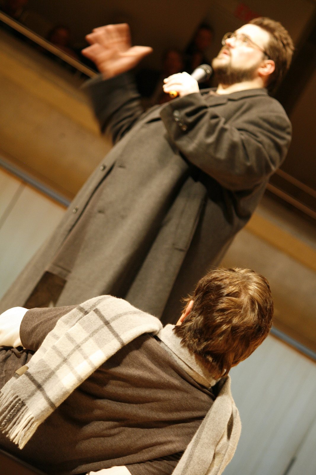 Kevin Smith speaking on stage with Jason Mewes in the foreground, Toronto, 2009