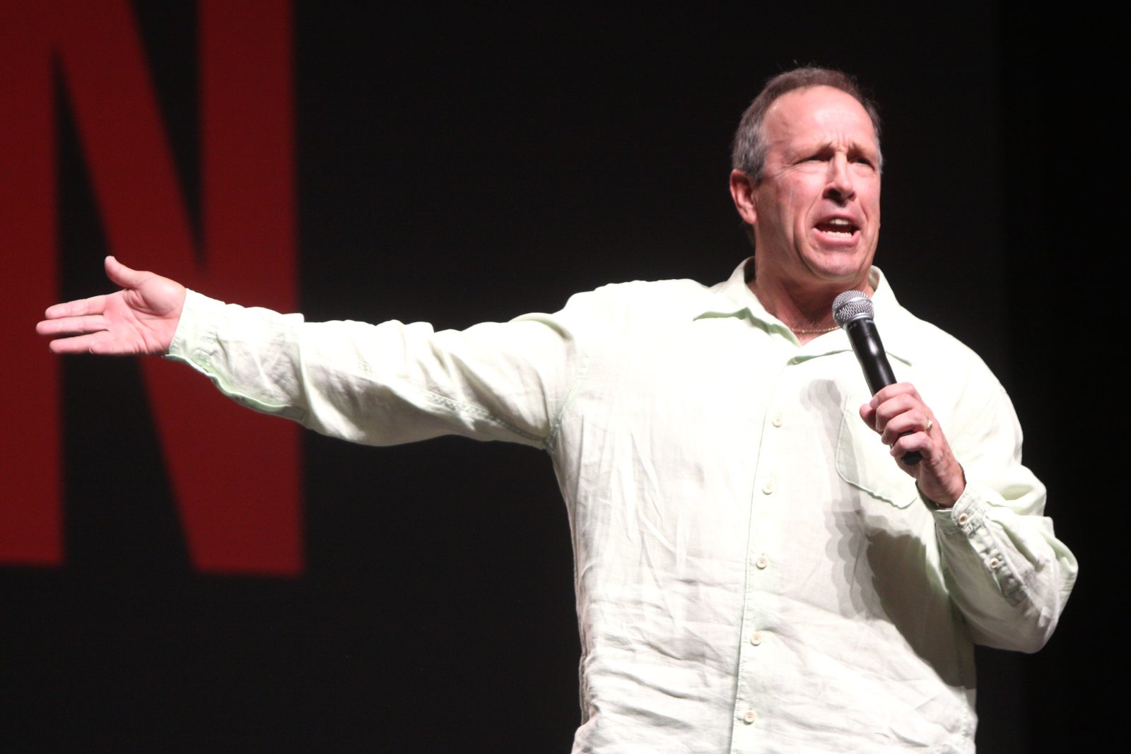 Comedian Jeff Allen performing on stage with a microphone in Phoenix, Arizona, 2012 - Jeff Allen tickets