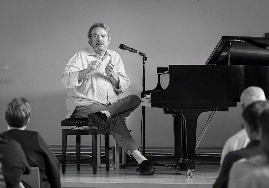 Jimmy Webb leading a masterclass beside the piano at Deichmanske bibliotek, Oslo Jazzfestival, 2016