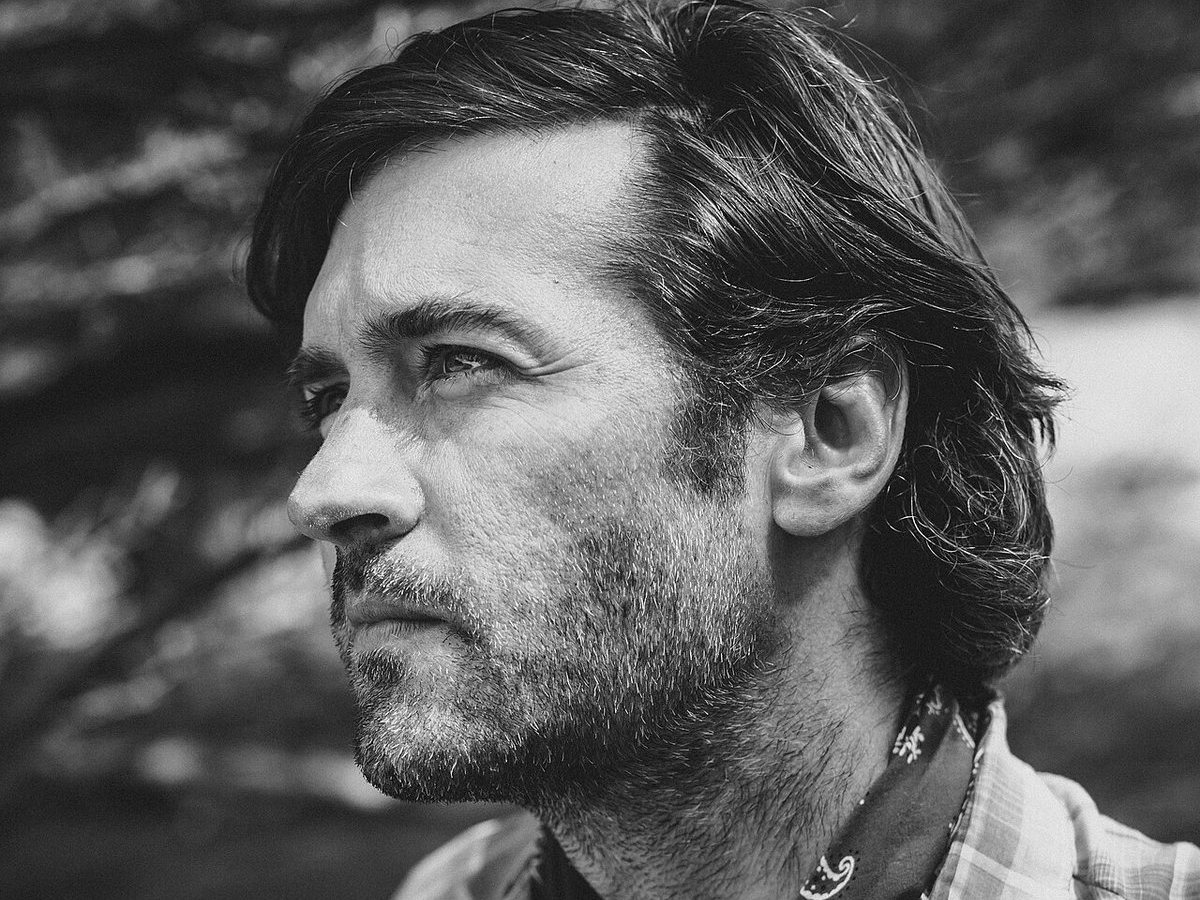 Buy John Craigie & The Bones of J.R. Jones tickets on StubOrder Black and white portrait of John Craigie, June 2021
