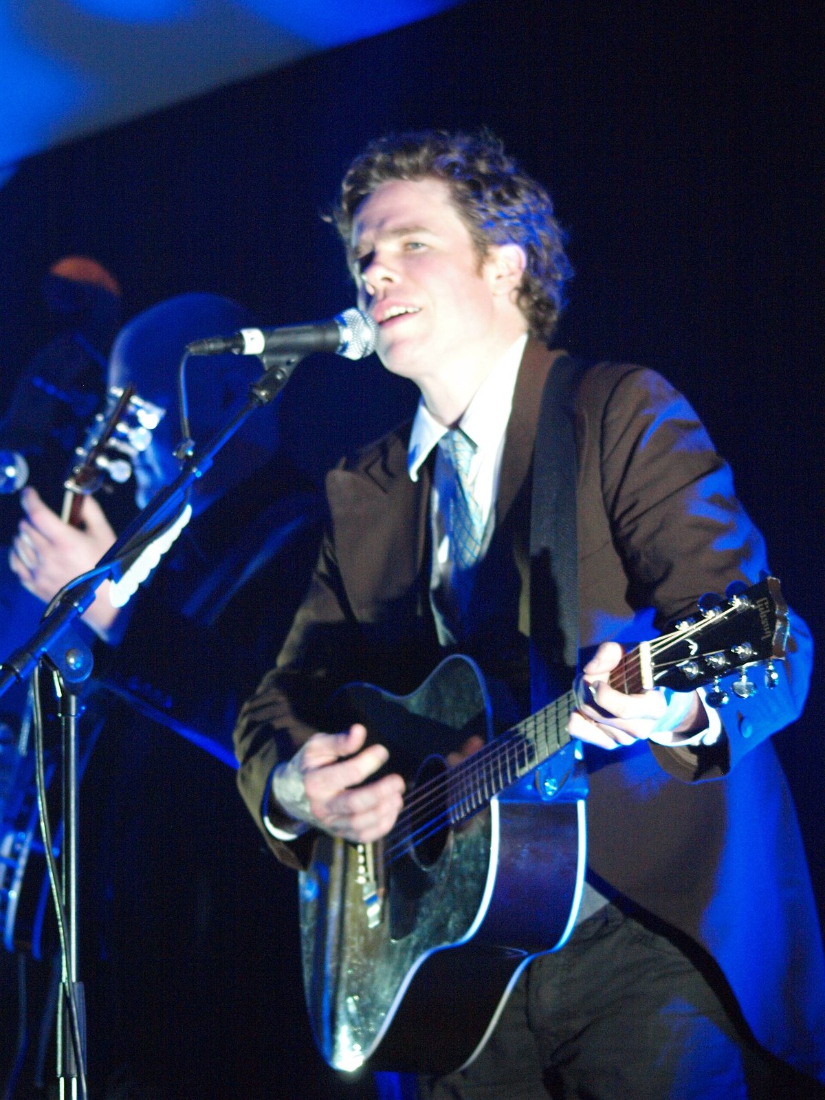 Josh Ritter performing with acoustic guitar at the Riverbank Hotel, Wexford, Ireland, 2009