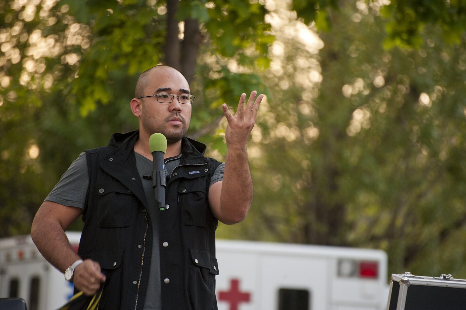 Justin Rivera performing comedy magic for airmen at the Transit Center at Manas, Kyrgyzstan, 2014