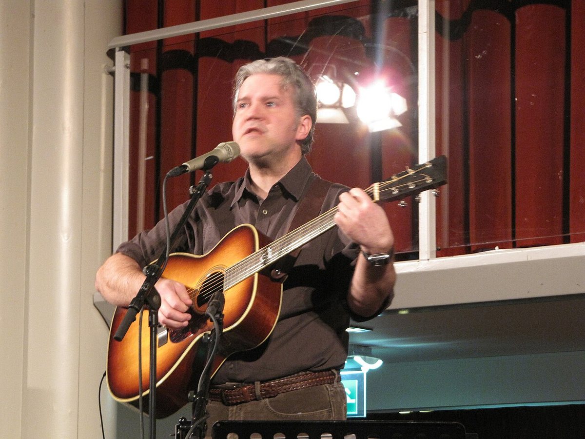 Buy Lloyd Cole tickets on StubOrder Lloyd Cole performing with an acoustic guitar at the Amstelkerk, Amsterdam, 2012