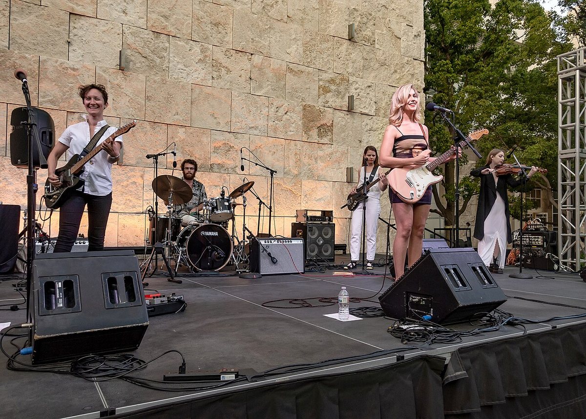 Buy Lola Kirke tickets on StubOrder Lola Kirke and her band performing on an outdoor stage at the Getty Museum, Los Angeles, 2018