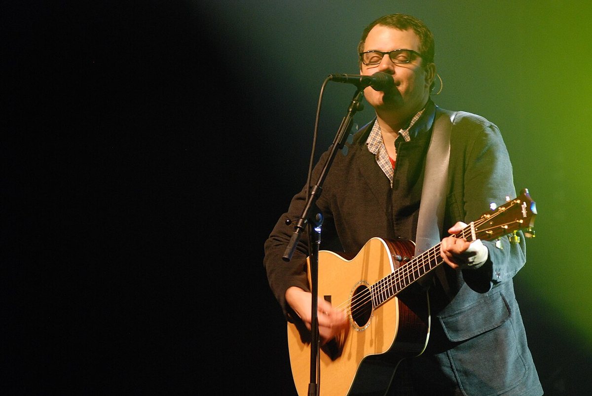 Matthew Good singing with an acoustic guitar at the Playhouse, Fredericton, October 2007