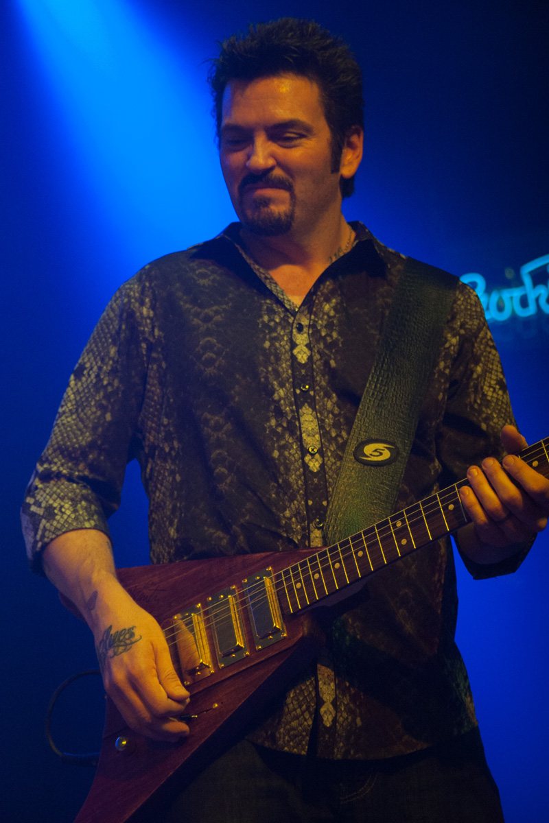 Mike Zito playing electric guitar on stage with Royal Southern Brotherhood at the Harmonie, Bonn, Germany, 2012