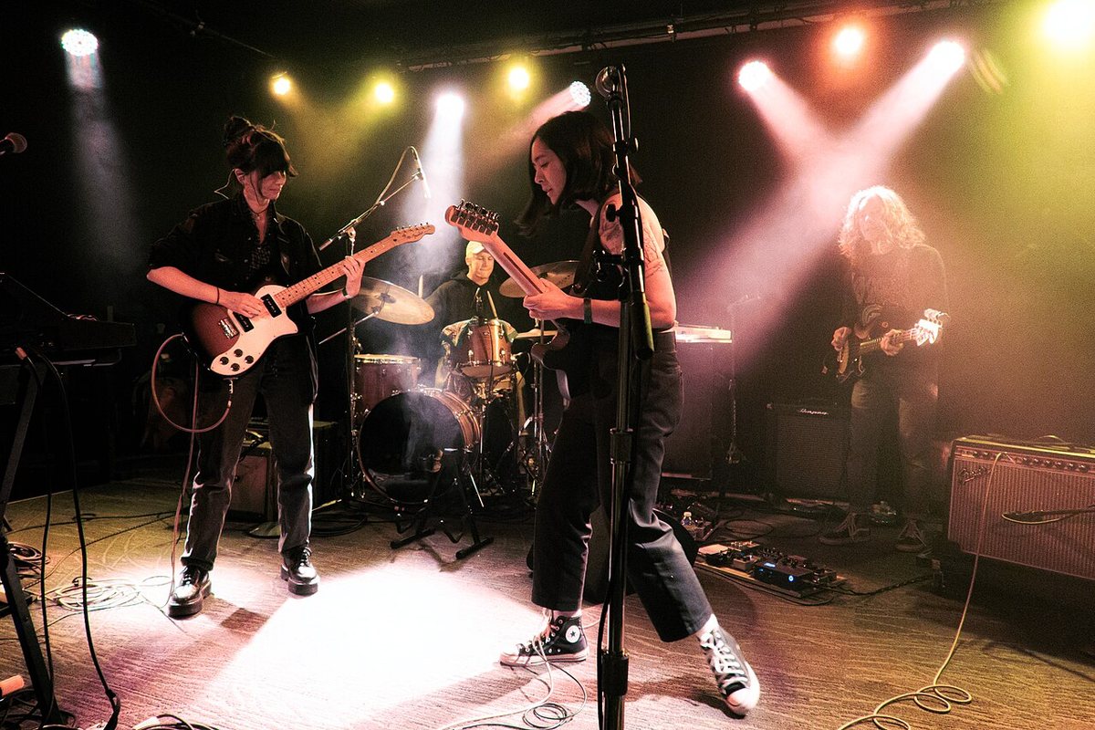 Mini Trees performing as a full band on stage at Madame Lou's, Seattle, June 2022