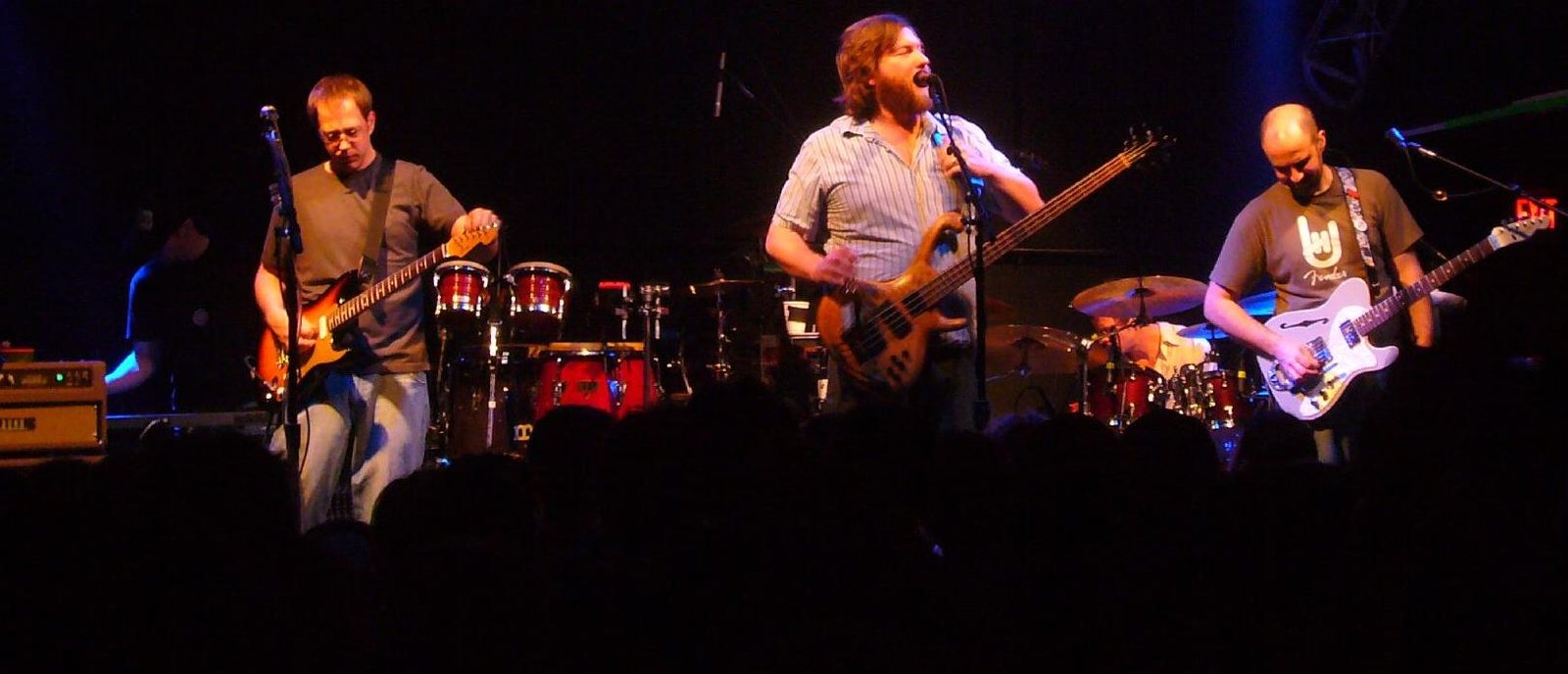 The band moe. on stage tuning between songs, March 2007