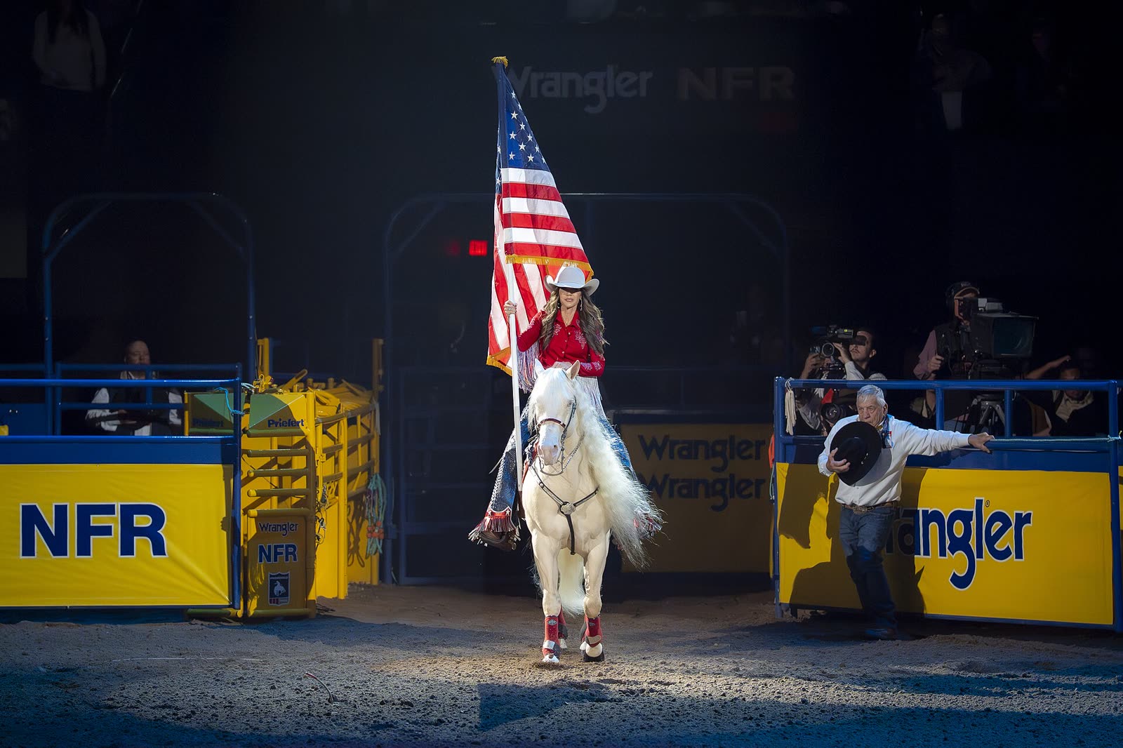 Flag rider on horseback in the arena at the Wrangler National Finals Rodeo - National Finals Rodeo tickets