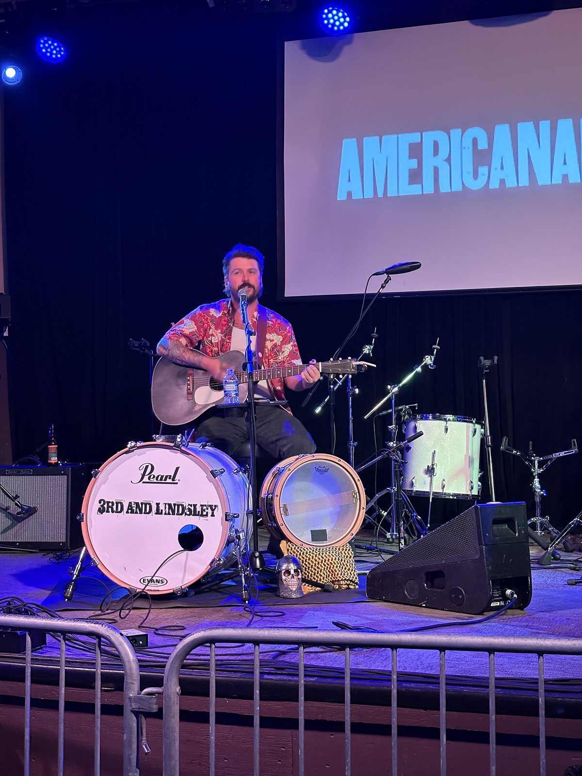 Nick Shoulders performing with an acoustic guitar at 3rd and Lindsley during AmericanaFest, Nashville, 2026