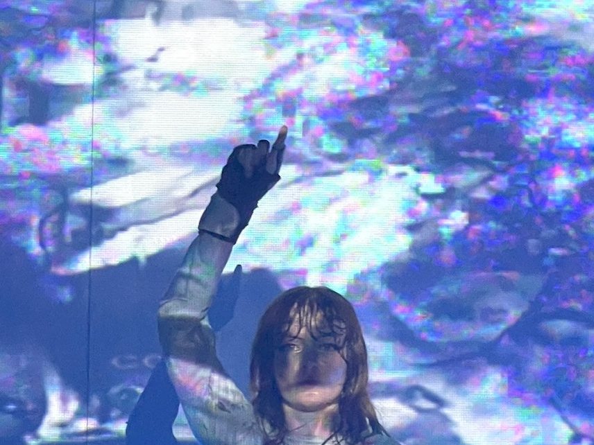 Ninajirachi performing a DJ set under projected visuals at Colour Factory, London, March 2026